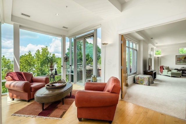 sunroom / solarium featuring plenty of natural light