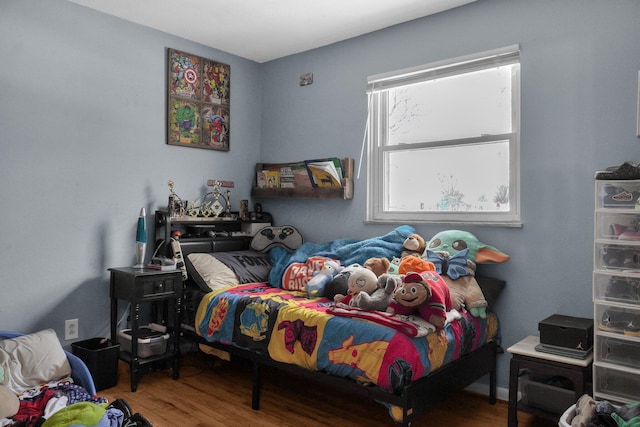 bedroom with wood-type flooring