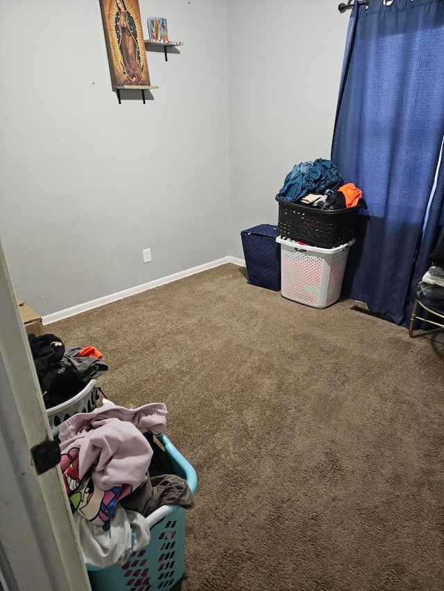 miscellaneous room featuring carpet