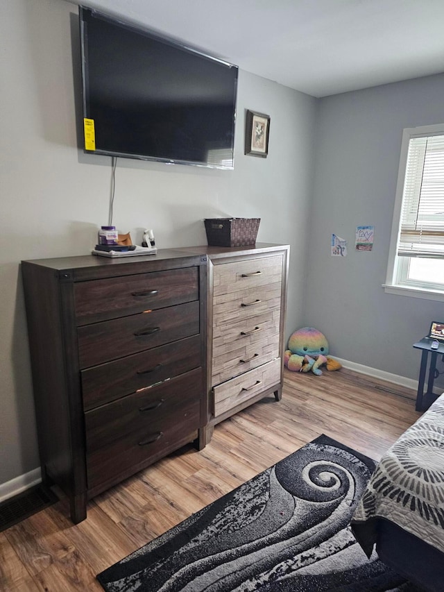 bedroom featuring light hardwood / wood-style floors