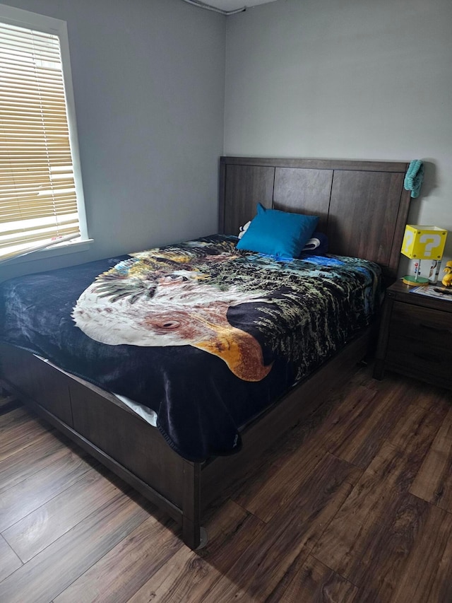 bedroom featuring wood-type flooring