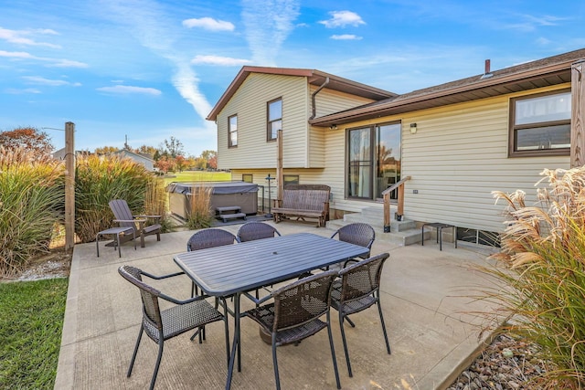 view of patio / terrace featuring a hot tub