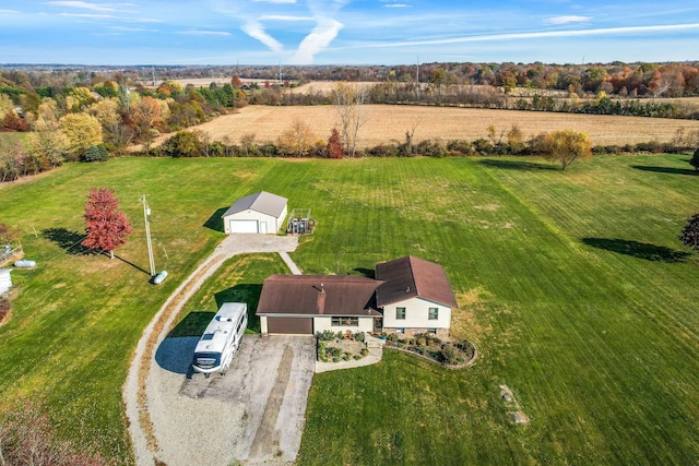 birds eye view of property featuring a rural view