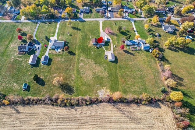 birds eye view of property featuring a rural view