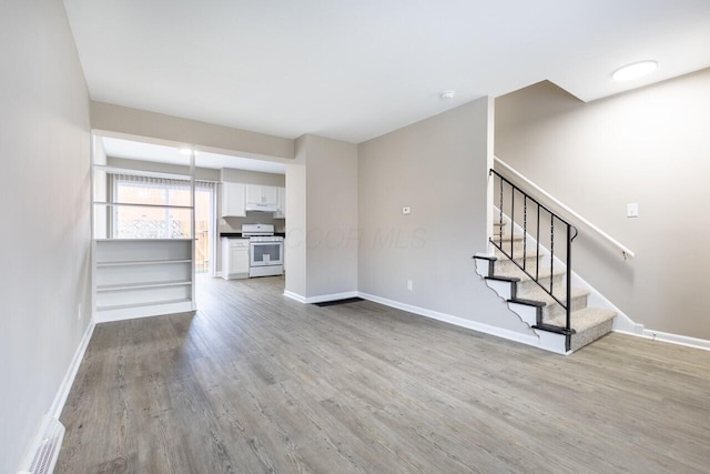 unfurnished living room featuring light hardwood / wood-style flooring