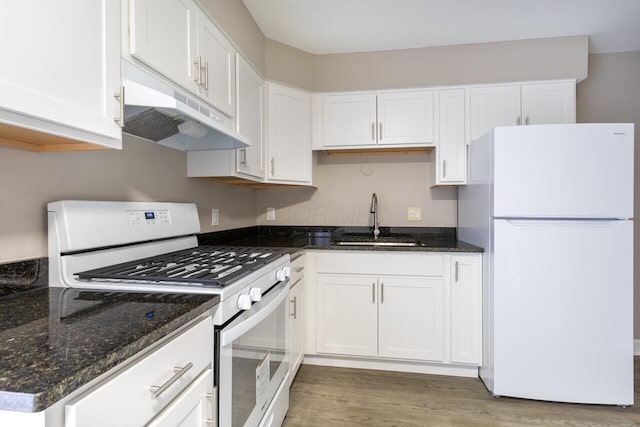 kitchen featuring white cabinetry, sink, hardwood / wood-style floors, and white appliances