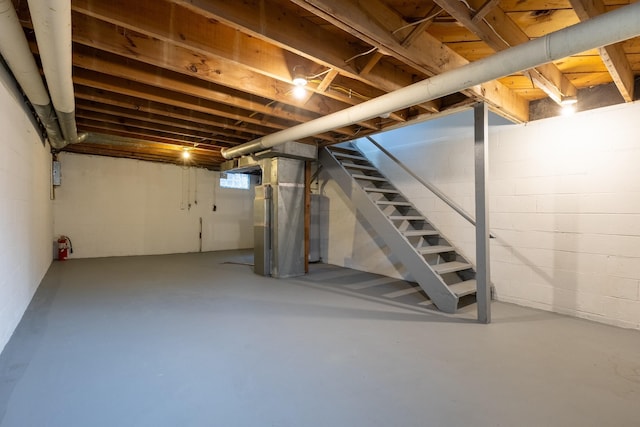 basement featuring heating unit