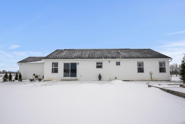 view of snow covered house