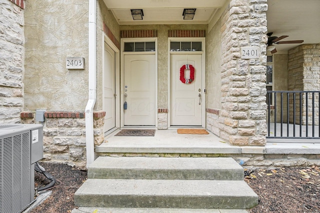 entrance to property featuring central air condition unit