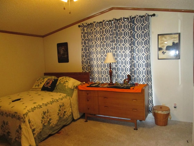 carpeted bedroom with ornamental molding and lofted ceiling