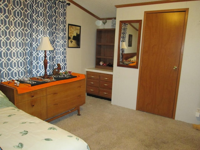 bedroom with light carpet, ornamental molding, and lofted ceiling