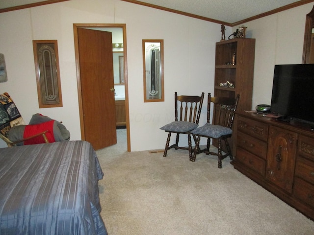 bedroom featuring lofted ceiling, a textured ceiling, ornamental molding, and carpet flooring