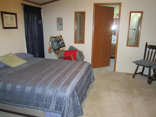 bedroom featuring light colored carpet and ornamental molding