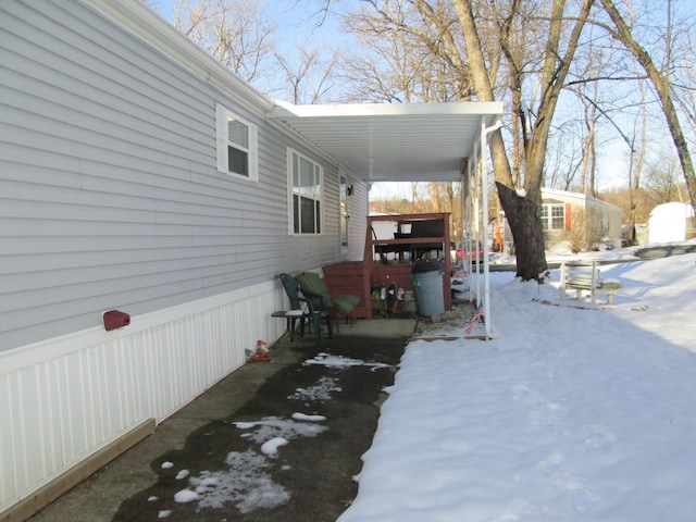 view of snow covered property