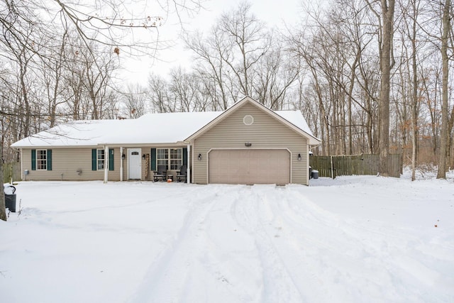 single story home featuring a garage