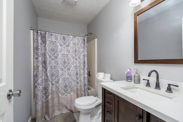 bathroom with vanity, visible vents, shower / bath combination with curtain, a textured ceiling, and toilet