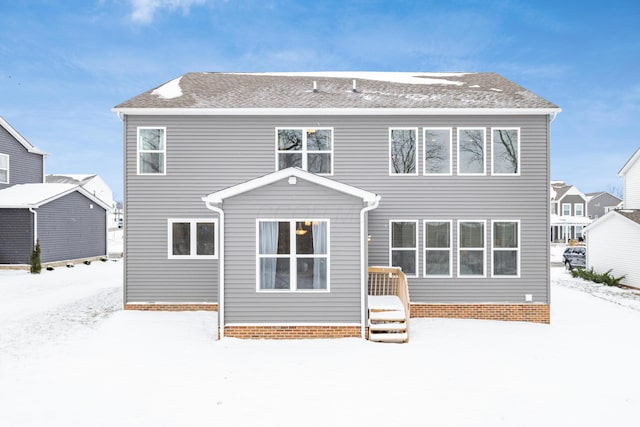 view of snow covered property