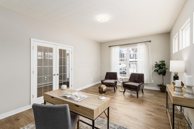 interior space with french doors and wood-type flooring