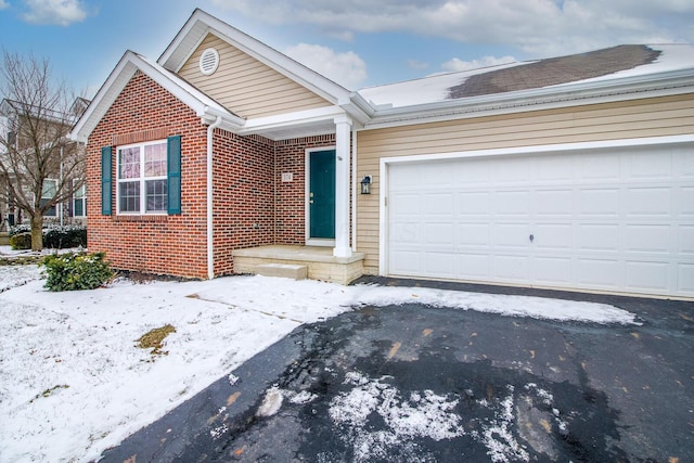 view of front of house with a garage