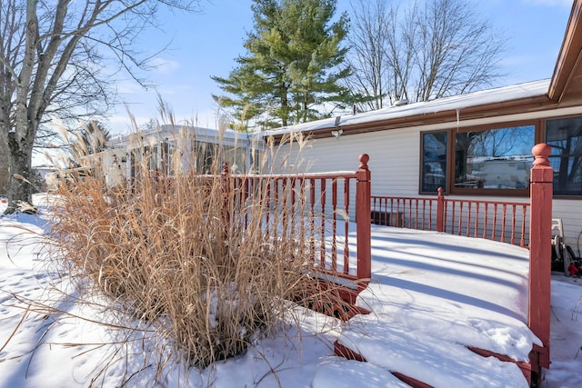 view of snow covered deck