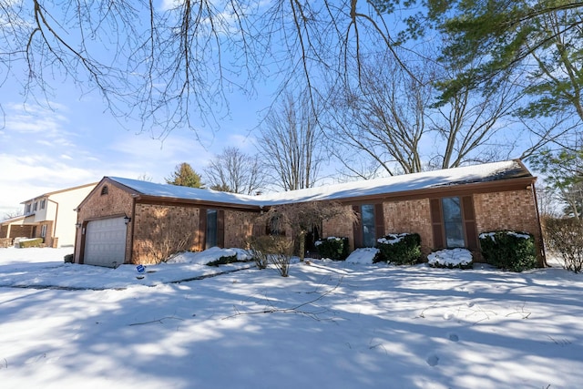 ranch-style home with a garage