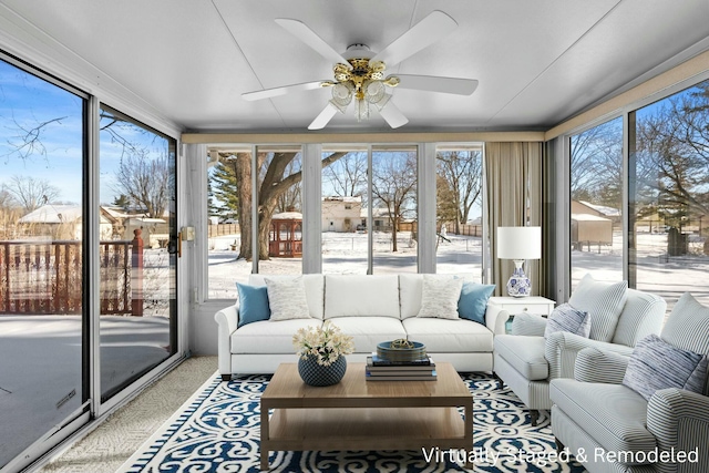 sunroom with ceiling fan