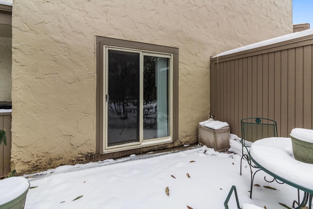 view of snow covered patio