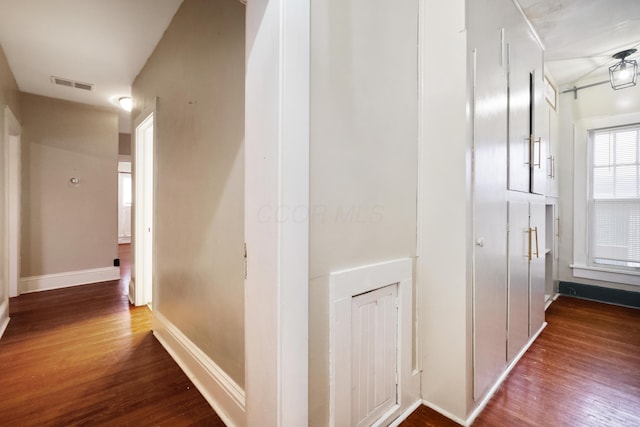 hallway featuring wood-type flooring