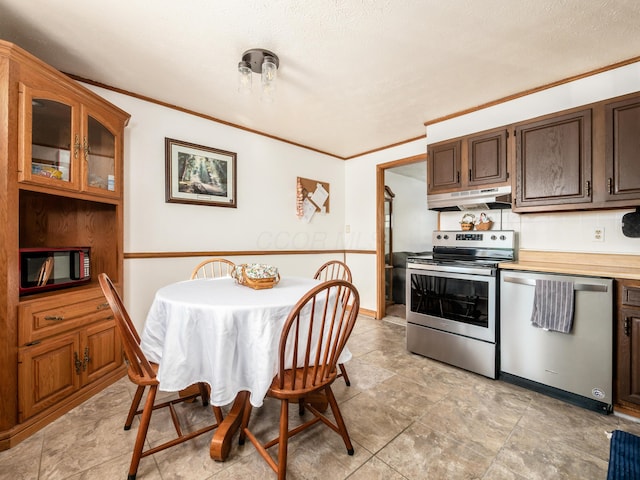 kitchen featuring dark brown cabinets, stainless steel appliances, and ornamental molding