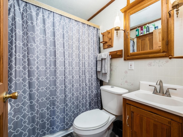 bathroom featuring walk in shower, vanity, tile walls, and toilet