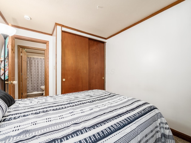 bedroom featuring a closet and ornamental molding