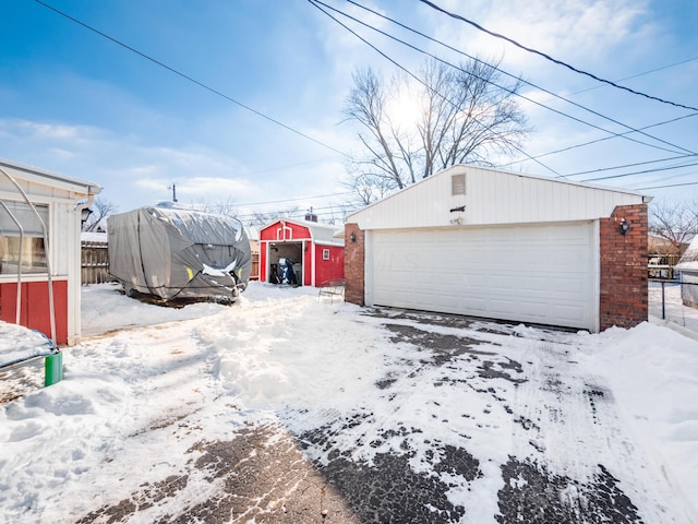 view of snow covered garage