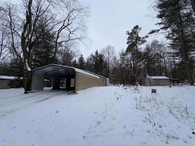 exterior space with a carport