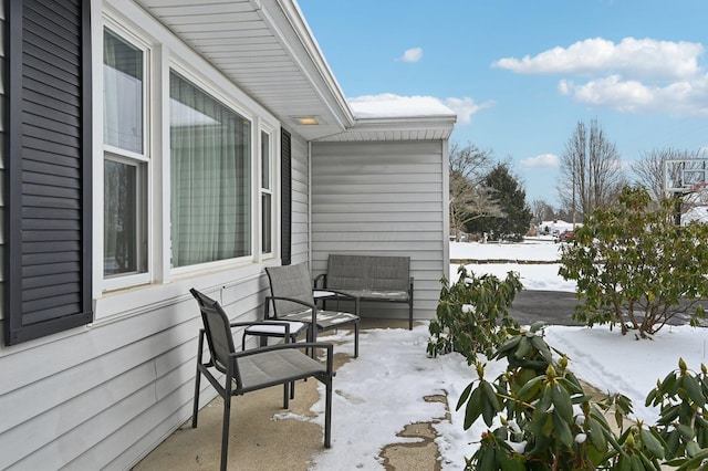 view of snow covered patio