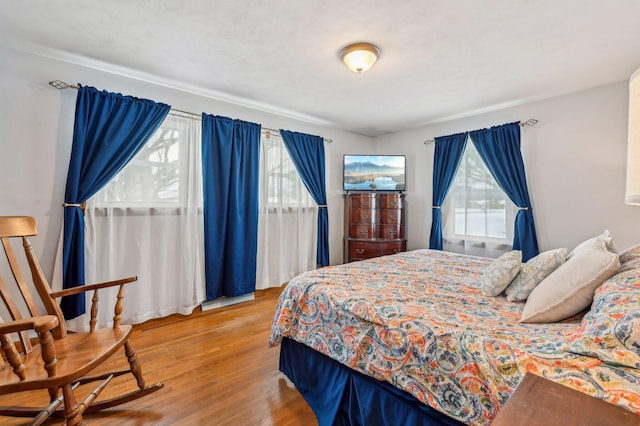 bedroom with light hardwood / wood-style flooring