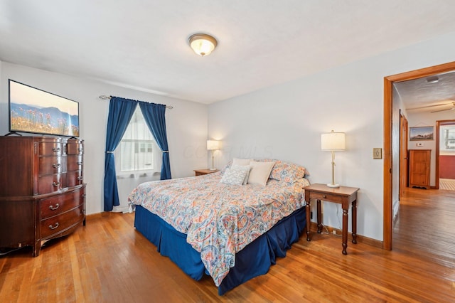 bedroom featuring wood-type flooring