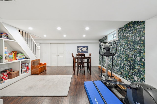 playroom with dark hardwood / wood-style floors