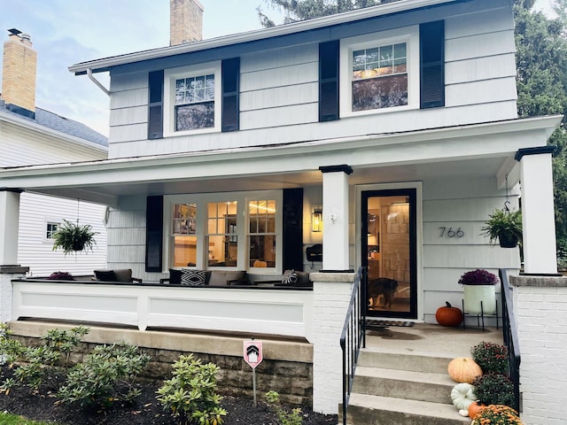 exterior space featuring covered porch