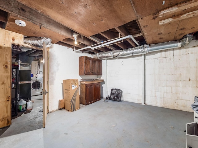 basement with washer / dryer