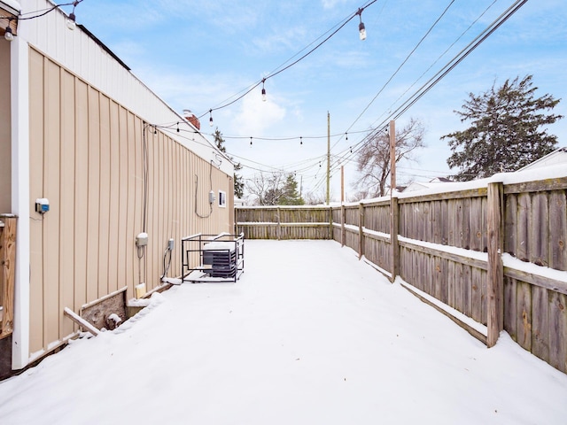 view of yard covered in snow