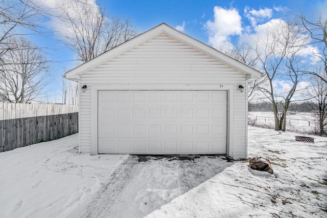 view of snow covered garage