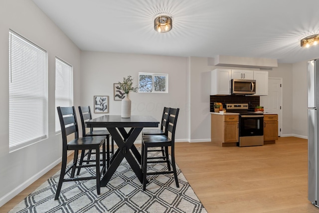 dining area featuring light hardwood / wood-style flooring