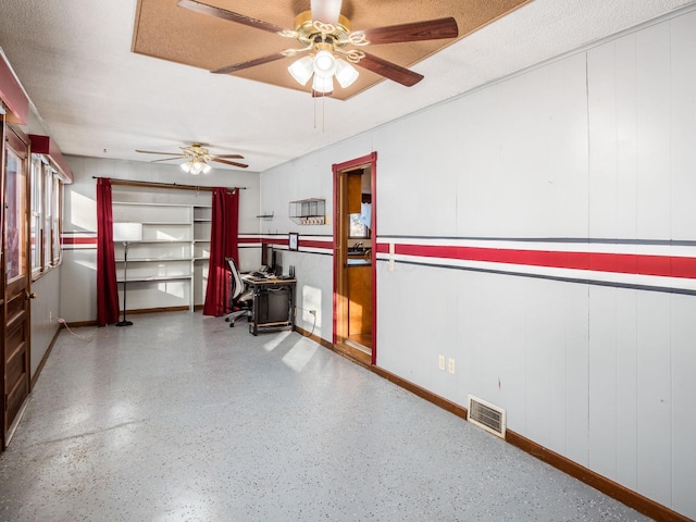 garage with ceiling fan