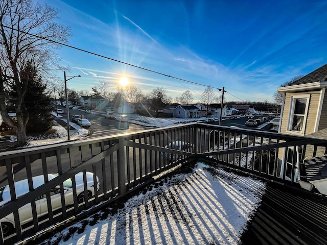 view of snow covered deck