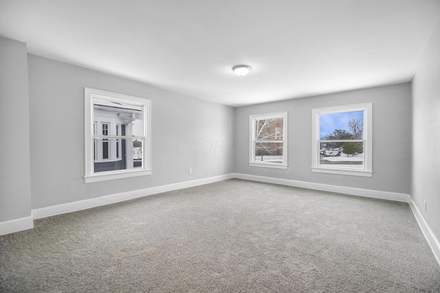 view of carpeted spare room