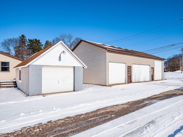 view of snow covered garage