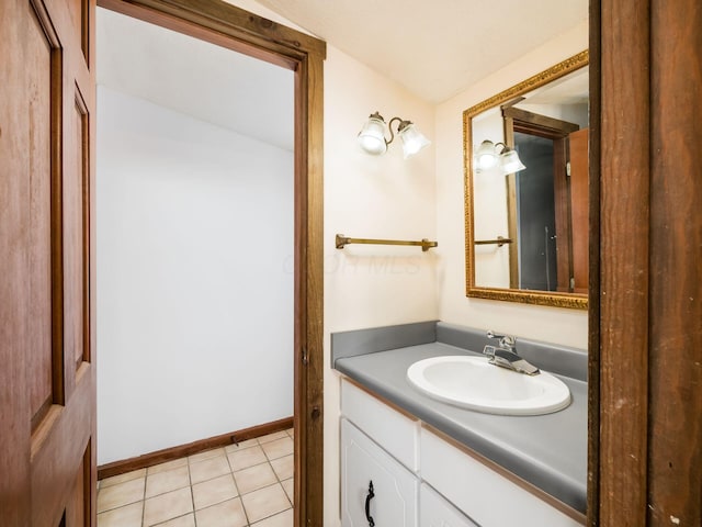 bathroom with vanity and tile patterned flooring