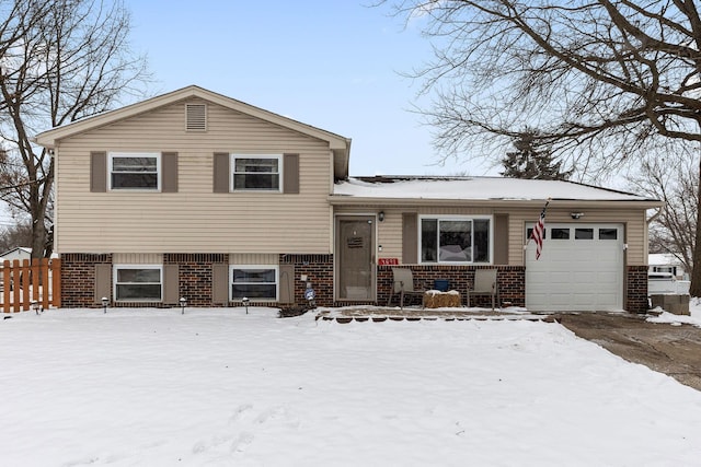 split level home featuring a garage