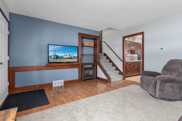 living room featuring light wood-type flooring