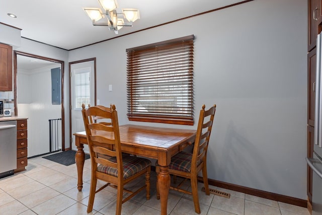 dining space featuring light tile patterned flooring, electric panel, and a chandelier